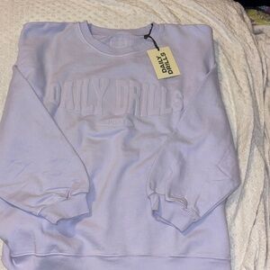 SOLD OUT ONLINE* Daily Drills Light Purple Crewneck
